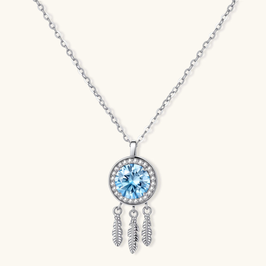 Sterling silver dreamcatcher pendant with blue moissanite center and three feather charms on adjustable chain.