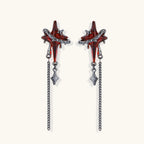 Gothic red resin dagger earrings with silver chain details and S925 posts on white background