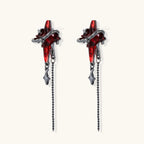 Gothic red resin dagger earrings with silver chain details and S925 posts on white background