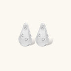 Silver-plated hoop earrings with star cutout designs, shown open and closed on white background, 17mm diameter.