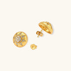 Round domed gold-plated stud earrings with brushed finish and an 8-point star paved in cubic zirconia stones.